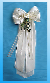 Kerzenschleife in Creme mit Buchs